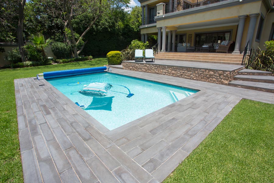 charcoal pavers around pool